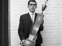 Young Kiltimagh man with football trophy, December 1967 - Lyons0011918.jpg  Kiltimagh GAA: Young Kiltimagh man with football trophy, December 1967 : 19671228 Young Kiltimagh man with football trophy.tif, GAA Functions, Kiltimagh GAA, Lyons collection