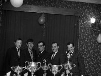 Garrymore GAA Committee with their club trophies, December 1969 - Lyons0012073.jpg  Garrymore GAA Committee with their club trophies, December 1969 : 19691230 Garrymore Committee with their club trophies.tif, GAA Functions, Garrymore GAA, Lyons collection