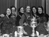 Ladies at GAA Function with trophies, January 1976 - Lyons0012162.jpg  Ladies at GAA Function with trophies, January 1976 : 19760102 Ladies at GAA Functions with the trophies.tif, GAA Functions, Lyons collection