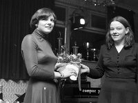 Linda Colgan presenting bouquet to Mona Hoban at MAyo Ladies GAA dinner, March 1976 - Lyons0012167.jpg  Linda Colgan presenting bouquet to Mona Hoban at MAyo Ladies GAA dinner, March 1976 : 19760304 Linda Colgan presenting boquet to Mona Hoban.tif, GAA, GAA Functions, Lyons collection, Mayo Ladies GAA