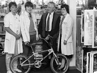 Presentation of bicycle in Don McGreevy's shop for raffle in new GAA Park, May 1985 - Lyons0011699.jpg  Presentation of bicycle in Don McGreevy's shop for raffle in new GAA Park, May 1985