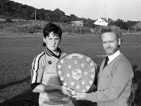 WEstport G.A.A club: Cormac O' Cionnaith presenting shield of medals to the Captain, December 1986 - Lyons0011712.jpg  WEstport G.A.A club: Cormac O' Cionnaith presenting shield of medals to the Captain, December 1986 : Hurling, Westport