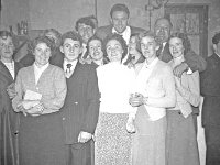 Joe Lynch with his fans in Mulligans Hall, Achill, 1956. - Lyons0017461.jpg  Joe Lynch with his fans in Mulligans Hall, Achill, 1956. : 1956 Joe Lynch with his fans in Mulligans Hall 2.tif, 1956 Misc, Achill, Lyons collection