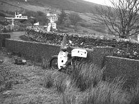 The search for three farmers in Slievemore, Achil, January 1983. - Lyons0017693.jpg  The search for three farmers in Slievemore, Achill for Olivia Hall Irish Times, January 1983.  Honda 50 waiting for it's owner. : 19830110 Slievemore Achill 4.tif, Achill, Irish Times, Lyons collection