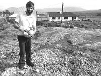 House in mountain flood path, Achill, September 1985. - Lyons0017723.jpg  House in mountain flood path, Achill, September 1985.Heavy rain in mountain flood path in Achill effecting the house foundations. : 19850909 House in mountain flood path 2.tif, Achill, Lyons collection