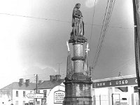 Ballina monument 1986. - Lyons0017120.jpg  Ballina monument 1986. This monument was a well known landmark in Ballina. It had to be relocated because of modern traffic congestion. The garage in the background is McAndrews Volkswagen agents. : 1986 Monument.tif, Ballina, Lyons collection