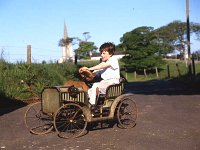 Billy Sommerville's son in a toy car, May 1988. - Lyons0017332.jpg  In Castlecomer, Co. Mayo.  Billy Sommerville's son in a toy car, May 1988. : 19880508 Billy Sommerville's son in a toy car 2.tif, 19880508 Billy Sommerville's son in a toy car.tif, Ballina, Farmers Journal, Lyons collection