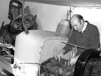 Billy Sommerville's vintage cars, May 1988. - Lyons0017333.jpg  Billy Sommerville's vintage cars, May 1988. Billy restoring a vintage car. In Castlecomer, Co. Mayo. : 19880508 Bill Sommerville's vintage cars 1.tif, Ballina, Farmers Journal, Lyons collection