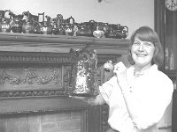 Mrs Sommerville with her collection of jugs. - Lyons0017335.jpg  Mrs Sommerville with her collection of jugs. In Castlecomer, Co. Mayo, May 1988. : 19880508 Mrs Sommerville with her collection of jugs 2.tif, 19880508 Mrs Sommerville with her collection of jugs 4.tif, Ballina, Farmers Journal, Lyons collection