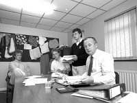 John Rowe MD of Rowewear, Ballina. - Lyons0017342.jpg  At right John Rowe MD of Rowewear manufacturers of childrens' clothes seen here in his office with his three sons. Ballina October 1990. : 19901004 Rowear.tif, Commercial, Kiltimagh, Lyons collection