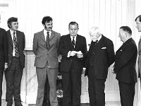 Presentation in the Ulster Bank in Ballinrobe - Lyons0016751.jpg  At the Ulster Bank presentation ceremony of a cheque for the Ballinrobe Races. Centre of the photo Mr Jimmy O' Donnell, Manager of the Ulster Bank, Ballinrobe; Mr Mixie Murphy, Ballina, Director of the Ulster Bank presenting a cheque to Mr Staunton President of the Ballinrobe Race committee. At right Dermot O' Connor PRO, Ballinrobe Race committee.June 1974. : 1974 Misc, 197406 Ulster Bank Presentation in the Ulster Bank in Ballinrobe 1.tif, Ballinrobe, Lyons collection