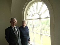 Pat Daly veterinary surgeon and his wife Deilia - Lyons0016769.jpg  Pat Daly veterinary surgeon and his wife Deilia with the Creagh Institute at the Georgian window at their home in Ballinrobe, April 1991. : 199104 Mr & Mrs Pat Daly.tif, 199104 Mr & Mrs Pat Doherty.tif, Ballinrobe, Lyons collection