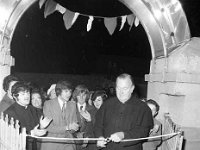 Opening of Youth Club in Ballinrobe, November 1972. - Lyons0016951.jpg  Cannon Scahill cutting the tape at the entrance to officially open the centre. At left Fr Bernard Shaughnessy. Opening of Youth Club in Ballinrobe, November 1972. : 1972 Misc, 19721103 Opening of Youth Club in Ballinrobe 5.tif, Lyons collection