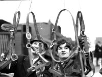 Ballinrobe mart, January 1973. - Lyons0016956.jpg  Choosing bridles at the  Ballinrobe mart, January 1973. : 19730124 Ballinrobe Mart 2.tif, Ballinrobe, Farmers Journal, Lyons collection