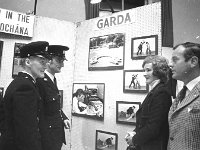 Careers Exhibition in the town hall Ballinrobe, May 1974. - Lyons0017028.jpg  At right Mr Norman Molloy, Manager of Bank of Ireland, Ballinrobe talking to two garda at their careers' stands. Careers Exhibition in the town hall Ballinrobe, May 1974. : 1974 Misc, 19740509 Careers Exhibition in the town hall Ballinrobe 2.tif, Ballinrobe, Lyons collection