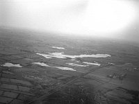 Aerial view of the river Robe flooding, November 1978.. - Lyons0017065.jpg  Aerial view of the river Robe flooding, November 1978. : 1978 Misc, 19781126 Aerial view of the river Robe flooding 3.tif, Ballinrobe, Lyons collection