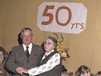 Mr and Mrs O'Connor's 50th wedding anniversary - Lyons0017078.jpg  Mr and Mrs O'Connor's 50th wedding anniversary photographed with their grandchildren. The happy couple cutting the cake. Ballinrobe July 1980. : 19800727 Mr & Mrs O'Connor's 50th Wedding Anniversary 2.tif, Ballinrobe, Lyons collection