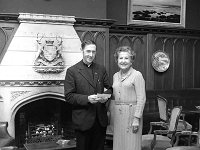 Presentation to Fr. Stephen Ludden, September 1980 - Lyons Ballintubber Abbey-15.jpg  Fr Stephen Ludden ADM Ballintubber Abbey photographed in Ashford Castle with Mrs Cooper who presented a cheque for the Abbey Restoration fund. September 1980 : 198009 Presentation.tif, Ballintubber Abbey, Lyons collection