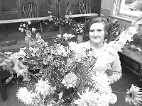 Ballyhaunis Agricultural Show, August 1971. - Lyons0017828.jpg  Claremorris lady with her flower display. Ballyhaunis Agricultural Show, August 1971. : 19710819 Ballyhaunis Agricultural Show 1.tif, Ballyhaunis, Farmers Journal, Lyons collection