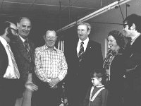 Mr Denis Gallagher Minister for the Gaeltacht visiting the Kenman factory in Geesala. - Lyons0018164.jpg  Mr Denis Gallagher Minister for the Gaeltacht visiting the Kenman factory in Geesala. Denis Gallagher third from the right. Left and right of Denis is Sonny Mangan and Peggy Mangan proprietors of Kenman with their daughter infront. Alsoincluded are personnel from Udaras. July 1977. : 19770720 Visit to Kenman Factory 2.tif, Belmullet, Lyons collection