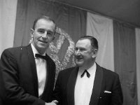 Castlebar International Song Contest 1967 - Lyons0005219.jpg  Castlebar International Song Contest 1967. Andy Galligan, winning composer being congratulated by "Dinjoe" RTE  Denis Fitzgibbons compere. Denis was also representing the sponsor Volkswagen Ireland Ltd. : Castlebar Song Contest, Fitzgibbons, Galligan