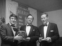 Castlebar International Song Contest 1967 - Lyons0005221.jpg  Castlebar International Song Contest 1967: Mr Owen Lysacht, Director Guinness Ireland presents prize to Butch Moore, singer of the winning song in the Pop Section.  Also in the picture is RTE newsreader David Timlin who was compere for the night. : Castlebar Song Contest, Lysacht, Moore, Timlin