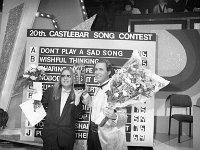 Castlebar International Song Contest 1985 - Lyons0005279.jpg  Castlebar Song Contest 1985. Composer Ulf Nordquist and singer Sten Nilsson holding the Berger trophy high in victory. : Castlebar Song Contest, Nilsson, Nordquist