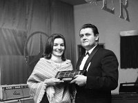 Castlebar International Song Contest 1968 - Lyons0005349.jpg  Castlebar Song Contest 1968. Cathal Duffy making a presentation to a winning competitor. : Castlebar Song Contest, Duffy