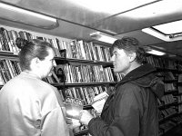 Mayo mobile library, October 1987 - Lyons0012388.jpg  Distinguished author and journalist (Irish Times) Michael Viney talking to a Louisburgh neighbour in the mobile library, October 1987. : 198710 Mayo Mobile County Library 1.tif, Castlebar, Farmers Journal, Lyons collection