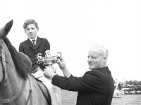 Castlebar Agricultural Show, July 1968. - Lyons0012511.jpg  Fr Charles O' Malley CC presenting his cup to a winning young rider. Castlebar Agricultural Show, July 1968. : 19680704 Castlebar Agricultural Show 1.tif, 19680704 Castlebar Agricultural Show.tif, Castlebar, Farmers Journal, Lyons collection