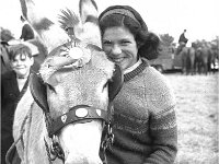 Castlebar Horse Show, July1969 - Lyons0012585.jpg  Young lady with her prize-winning donkey.Castlebar Horse Show, July1969 : 19690703 Horseshow in Castlebar 7.tif, Castlebar, Farmers Journal, Lyons collection