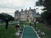 Breaffy House Hotel, October 1969. . - Lyons0012595.jpg  Breaffy House Hotel, October 1969. Assistant Manager Mr Agnew and Una's dog "Sherry" looking on at the Jack putt golfers. : 19691029 Breaffy House Hotel 1.tif, Castlebar, Lyons collection