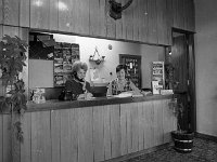 Welcome Inn Hotel, Castlebar - the reception desk, December 1970 - Lyons0012685.jpg  Welcome Inn Hotel, Castlebar - the reception desk, December 1970. : 1970 Misc, 19701212 The Welcome Inn - the reception desk.tif, Lyons collection