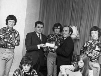 La Salle group with Brother Pious and Cathal Duffy, May 1971. - Lyons0012704.jpg  La Salle group with Brother Pious and Cathal Duffy, May 1971. Cathal Duffy presenting a sponsorship cheque to promote the group. : 19710515 La Salle with Brother Pious & Cathal Duffy 1.tif, Castlebar, Lyons collection