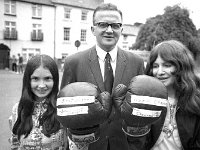 Sean Horkan, chairman of Castlebar Boxing Club and two young fem - Lyons0012717.jpg  Sean Horkan, chairman of Castlebar Boxing Club and two young female boxers, July 1971. : 1971 Misc, 19710721 Castlebar Boxing Club for Going Places 1.tif, Article for "Going Places" page in the Evening Herald, Castlebar, Lyons collection