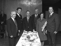 Presenatation to Captain Garvey, March 1973. - Lyons0012819.jpg  Presenatation to Captain Garvey. At the presentation ceremony to Captain and Mrs Garvey, members of Castlebar fire brigade. At left Michael Burns, Belcara originally from Westport and Michael O'Malley, Castlebar at right. March 1973 : 19730330 Presentations 2.tif, Castlebar, Lyons collection