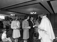 Tenth anniversary mass in Breaffy House Hotel, June 1973.  . - Lyons0012864.jpg  Tenth anniversary mass in Breaffy House Hotel, June 1973.  Michael Cadden Breaffy House Hotel Manager and his wife Mary bringing up the gifts. : 19730629 10th Anniversary Mass in Breaffy House 7.tif, Castlebar, Lyons collection