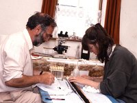 Professor Dr Martin Downes with a student in the research centre in Ballycastle, 1989 - Lyons00-20693.jpg  "Roots that go down very deep"; story about Dr Caulfield archaeologist and the restoration project at the Ceide Fields, Keadue, North Mayo by Sonia Kelly. : 19890719 Ceide Fields Keadue County Mayo 2.tif, Ceide Fields, Farmers Journal, Lyons collection