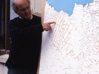 Dr Caulfield showing the layout of the 5,000 year old fields in Keadue, 1989. - Lyons00-20695.jpg  "Roots that go down very deep"; story about Dr Caulfield archaeologist and the restoration project at the Ceide Fields, Keadue, North Mayo by Sonia Kelly. Dr Seamus Caulfield, is a native of North Mayo, Archaeology Professor in UCD and project director of the Ceide Fields. : 19890719 Ceide Fields Keadue County Mayo 4.tif, Ceide Fields, Farmers Journal, Lyons collection