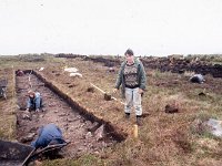 Students uncovering the keadue walls, July 1889 - Lyons00-20697.jpg  "Roots that go down very deep"; story about Dr Caulfield archaeologist and the restoration project at the Ceide Fields, Keadue, North Mayo by Sonia Kelly. : 19890719 Ceide Fields Keadue County Mayo 6.tif, Ceide Fields, Farmers Journal, Lyons collection