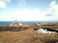 Ceide Fields, construction of new visitor centre, 1992. - Lyons00-20702.jpg  New visitor centre under construction and In the foreground uncovering of signs of primitive life. : 199204 Aerial photo of North Mayo Coastline 13.tif, Ceide Fields, Lyons collection