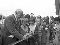 Electricity switch-on, Clare Island - Lyons0009127.jpg  Clare Island :.Cutting the tape for the official pier extension. (Neg 7 6A)