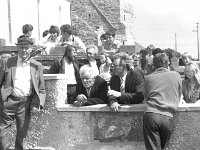 Clare Island school centenary. - Lyons0009163.jpg  Clare Island school centenary. Listening to the mass over the public address. (Neg 20 20A)