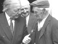 Launch of new Clare Island Survey. - Lyons0009197.jpg  Launch of new Clare Island Survey.  Mr Haughey admiring an islander's walking stick watched on by Martin Joe O' Toole. (Neg 27A)