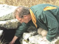 Fr Ned looking at the water in a Clare Island well. - Lyons0009226.jpg  Clare Island. Fr Ned looking at the water in a Clare Island well.