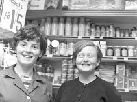 Roving camera in Claremorris, August 1986.. - Lyons0013273.jpg  Roving camera in Claremorris. Two shop assistants. August 1966. : 19660812 Roving Camera Claremorris 7.tif, Claremorris, Lyons collection