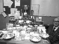 Claremorris Open Golf Week, September 1972. - Lyons0013400.jpg  Claremorris Open Golf Week, September 1972. Display of cups and trophies and Pat Merrick at right. : 1972 Misc, 19720902 Claremorris Open Golf Week 6.tif, Claremorris, Lyons collection