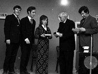 Presentation to Claremorris Players, November 1973. - Lyons0013420.jpg  Presentation to Claremorris Players, November 1973. : 1973 Misc, 19731109 Presentation to Claremorris Players 1.tif, Claremorris, In the Western Hotel Claremorris, Lyons collection, Mnsgr Curley making presentations to various players