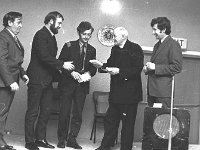 Presentation to Claremorris Players, November 1973. - Lyons0013422.jpg  Presentation to Claremorris Players, November 1973. : 1973 Misc, 19731109 Presentation to Claremorris Players 3.tif, Claremorris, In the Western Hotel Claremorris, Lyons collection, Mnsgr Curley making presentations to various players