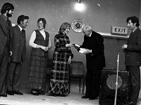 Presentation to Claremorris Players, November 1973. - Lyons0013423.jpg  Presentation to Claremorris Players, November 1973. : 1973 Misc, 19731109 Presentation to Claremorris Players 4.tif, Claremorris, In the Western Hotel Claremorris, Lyons collection, Mnsgr Curley making presentations to various players